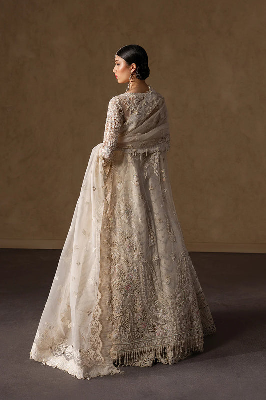 Luminous ivory bridal lehenga with intricate hand embellishment and floral embroidery. Paired with an elegant sheer dupatta for a timeless look.
