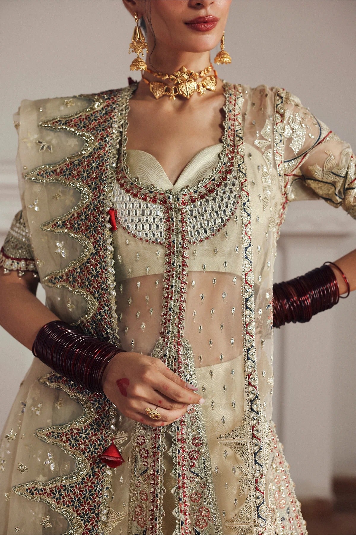Elegant cream organza and silk embroidered panels, borders, sleeves, and dupatta with printed trousers for a complete luxurious fabric set.