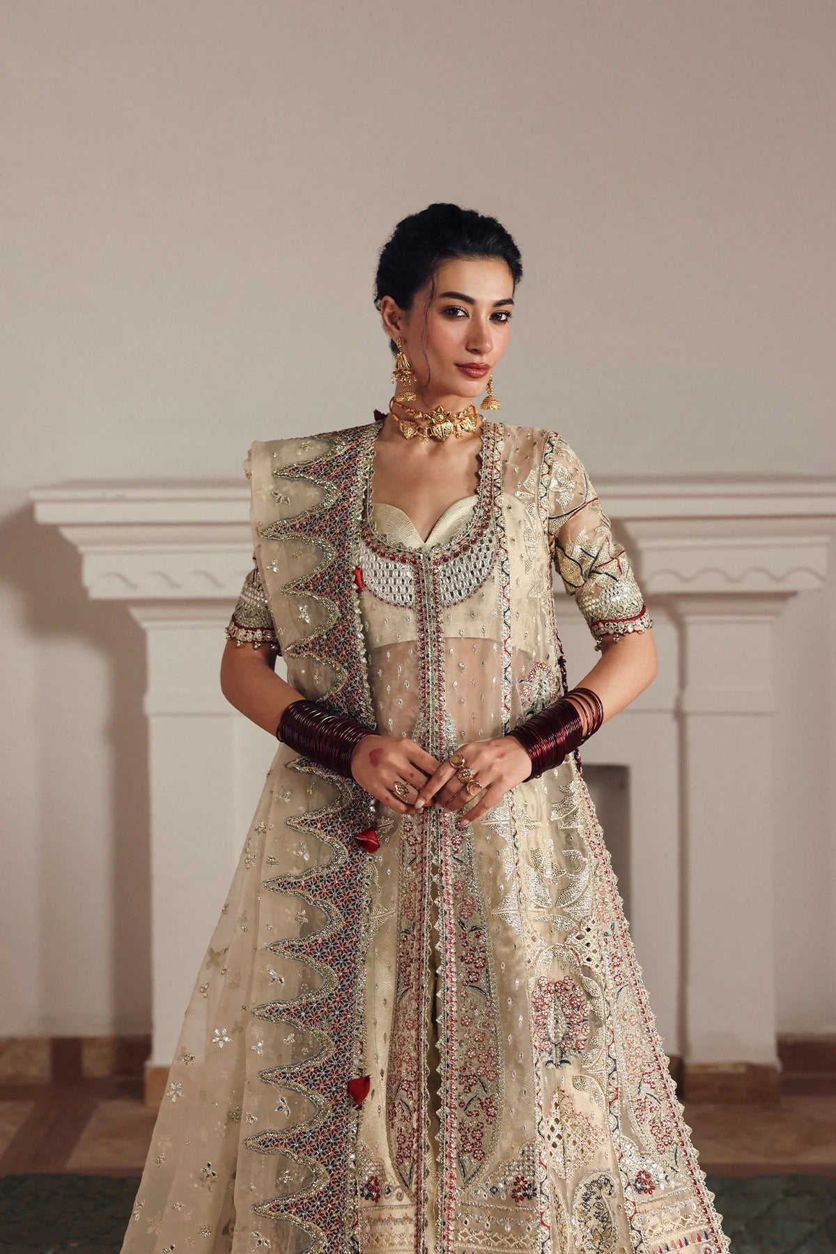 Elegant cream organza and silk embroidered panels, borders, sleeves, and dupatta with printed trousers for a complete luxurious fabric set.