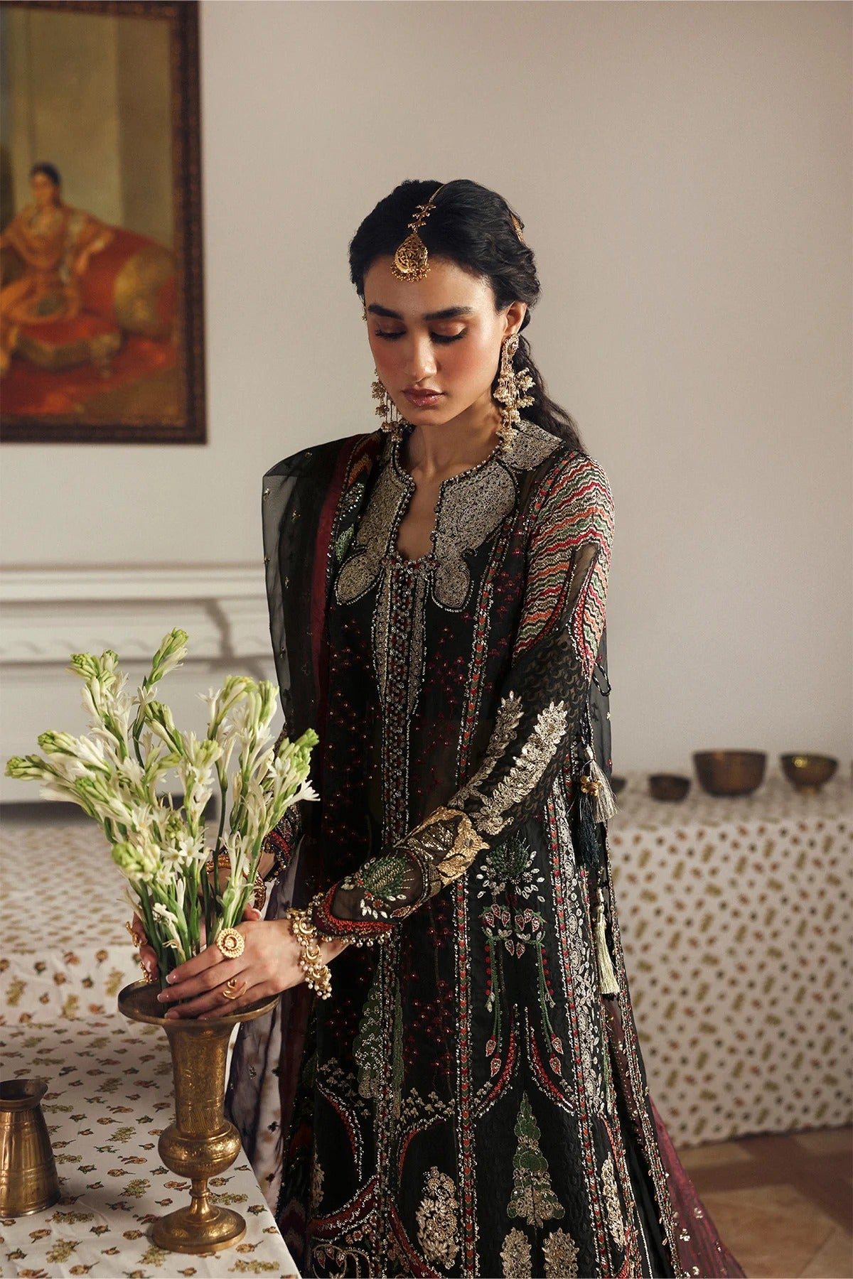Elegant black organza and raw silk embroidered panels, sleeves, borders, and dupatta with intricate digital prints for a luxurious custom outfit creation.