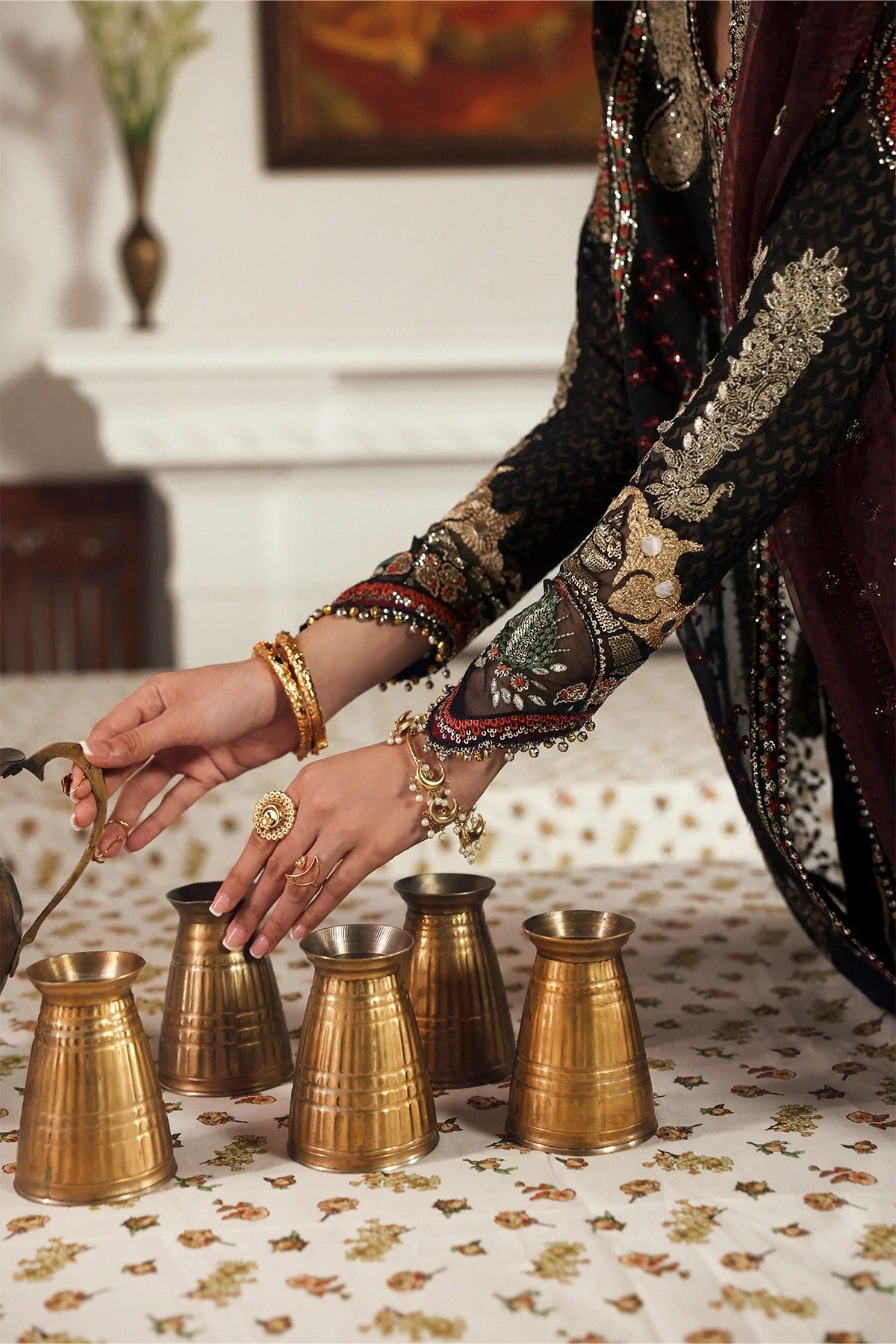 Elegant black organza and raw silk embroidered panels, sleeves, borders, and dupatta with intricate digital prints for a luxurious custom outfit creation.