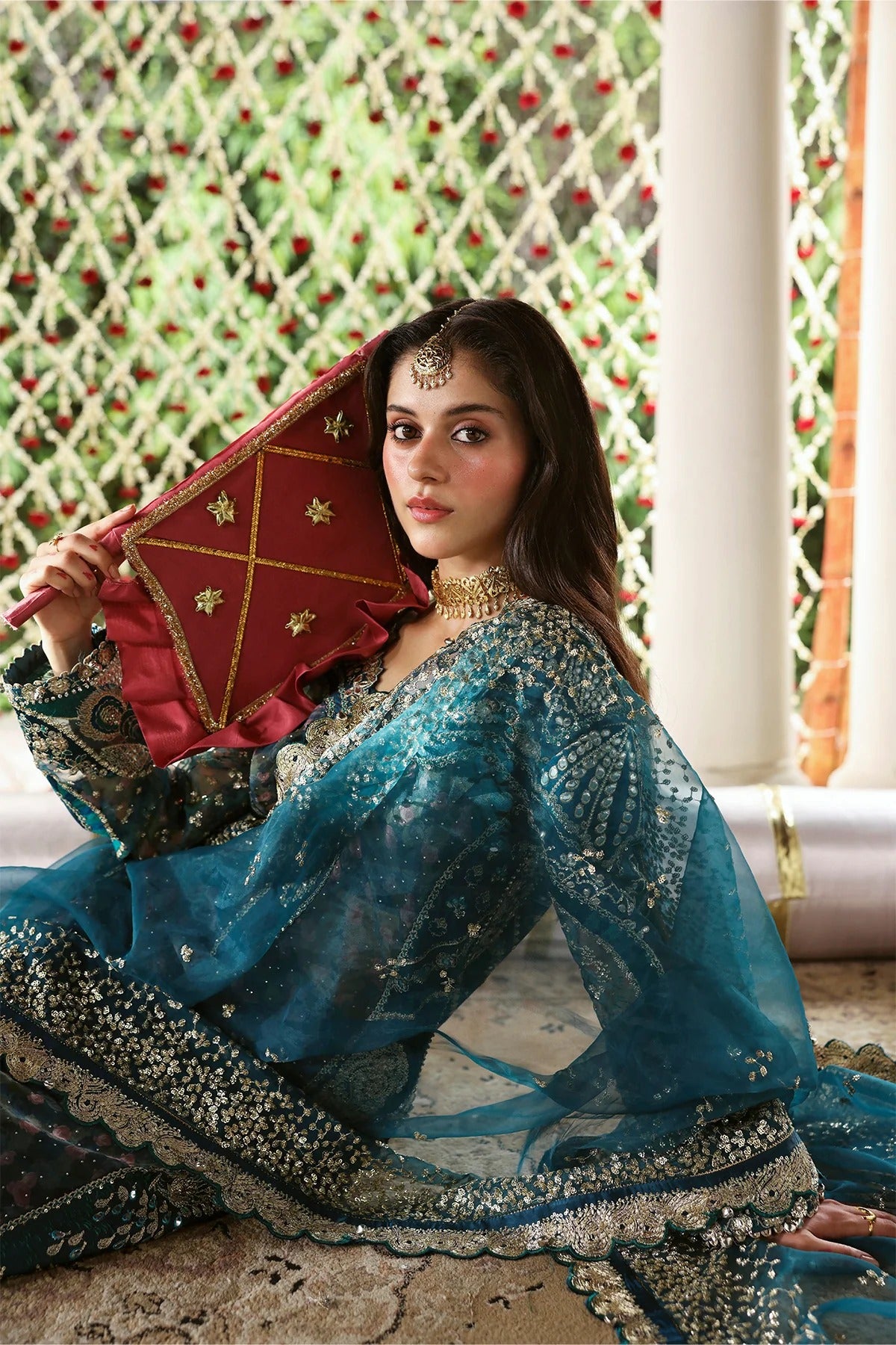 Shop sea green organza and raw silk fabric with intricate digital prints, embroidered sleeves, borders, patches, and dupatta for a stunning custom dress design.