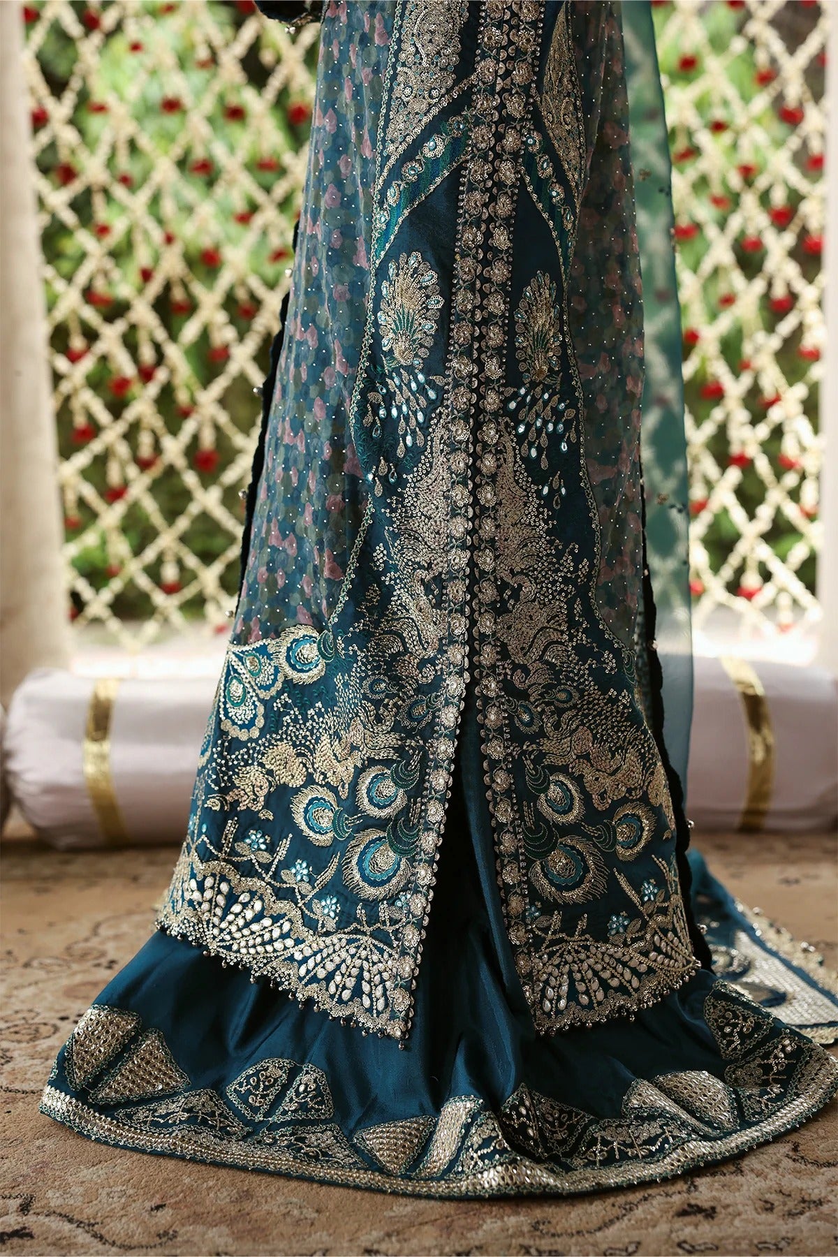 Shop sea green organza and raw silk fabric with intricate digital prints, embroidered sleeves, borders, patches, and dupatta for a stunning custom dress design.