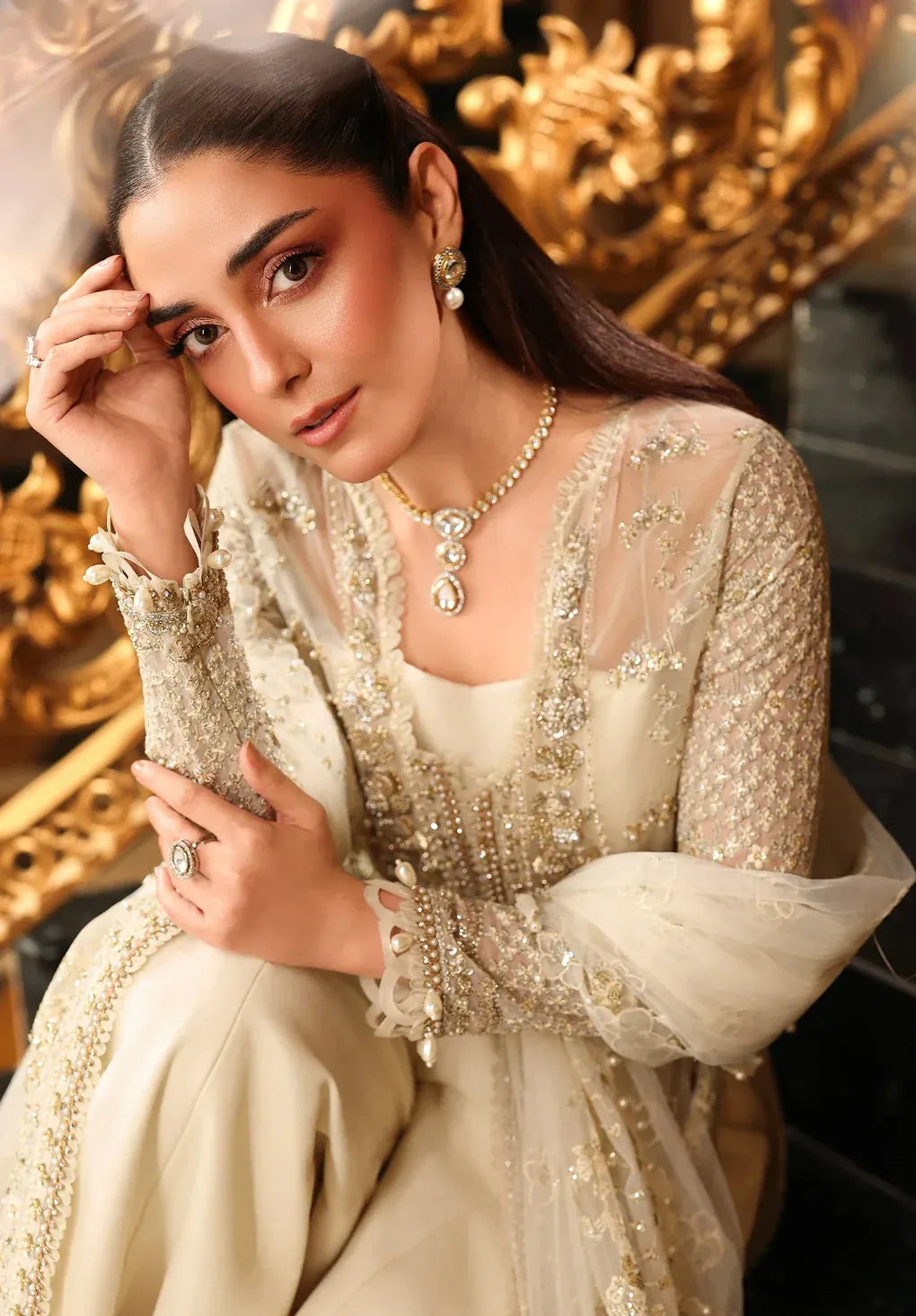 Celestia by Elaf Stardom ’25 features hand-embellished organza panels, embroidered dupatta, and raw silk inner — a timeless choice for refined elegance.