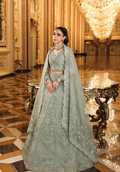 Lime Light by Elaf Stardom ’25 features hand-embroidered organza panels, elegant dupatta, and raw silk inner — perfect for festive gatherings and formal occasions.