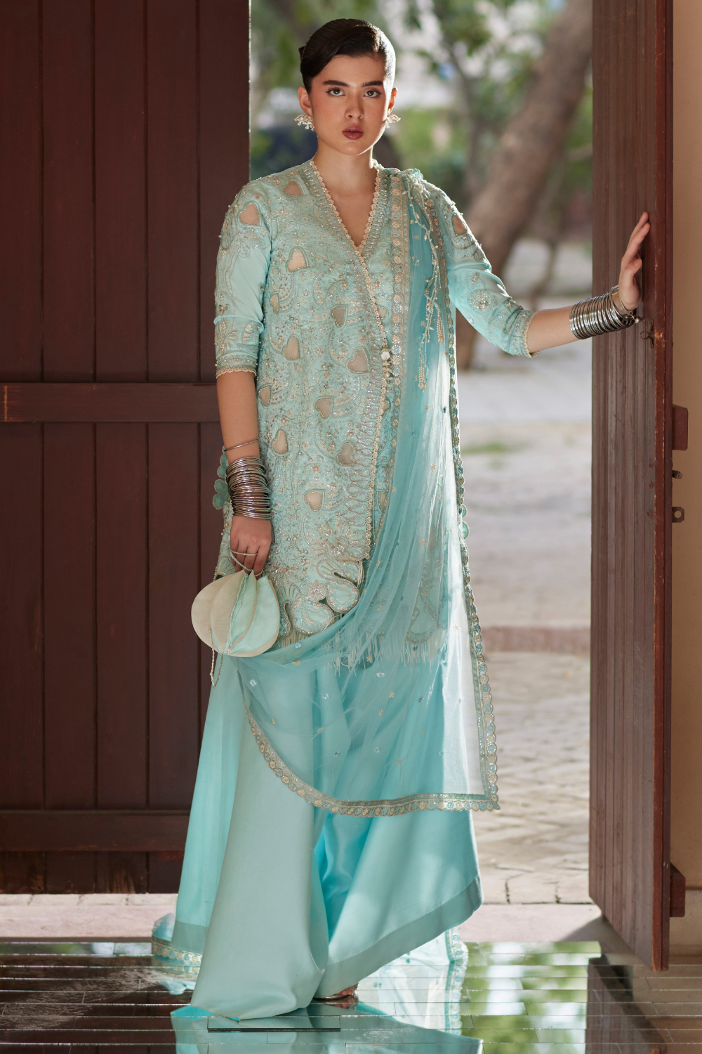Soraya Aks with draped net dupatta and statement pants