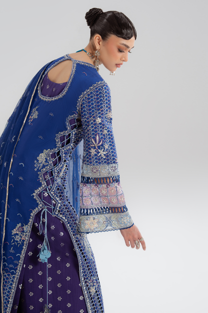 Soraya Évara blue and purple silk ensemble at Raz Ruya