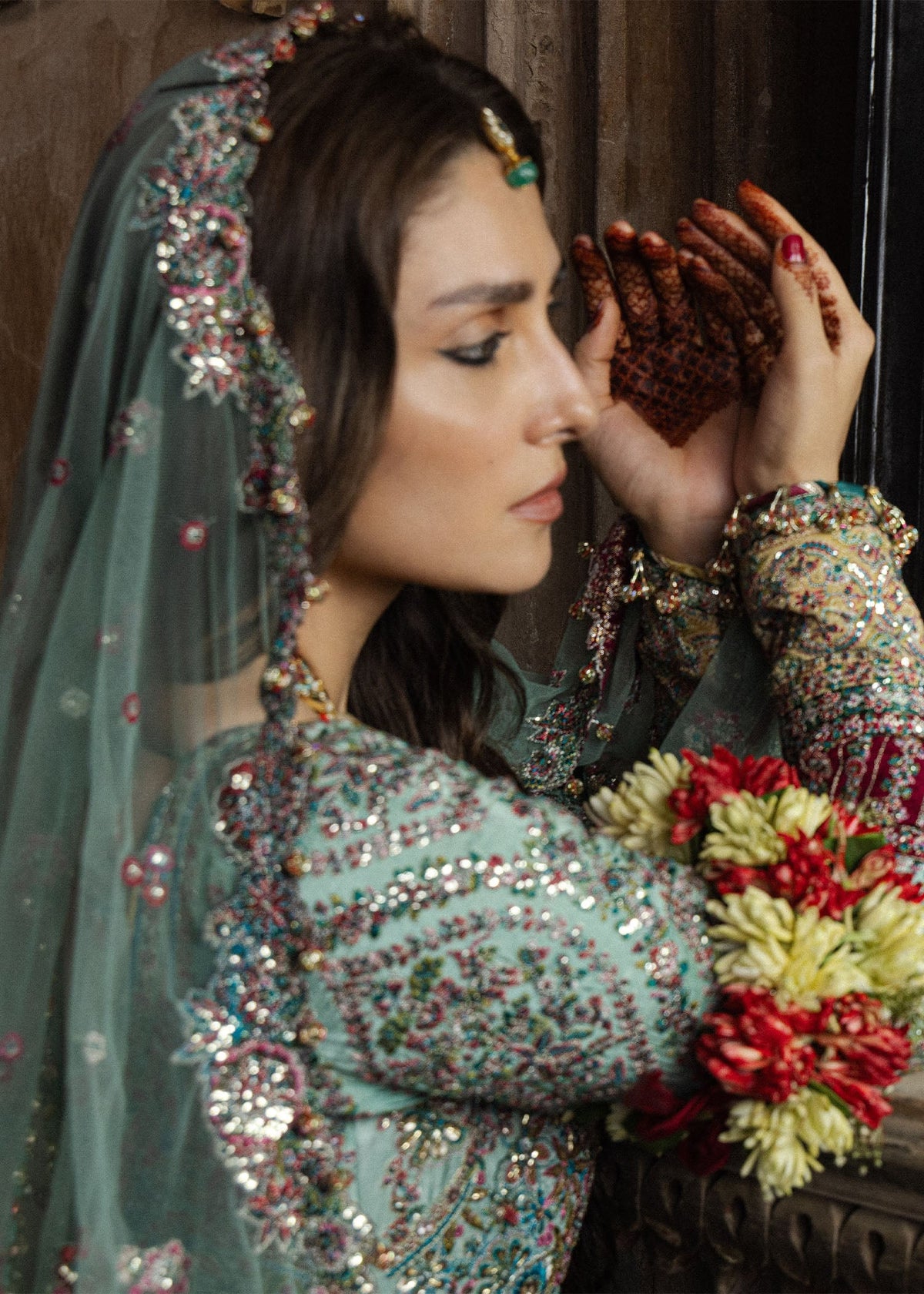 Hussain Rehar Zeenat side view of flowing pashwas