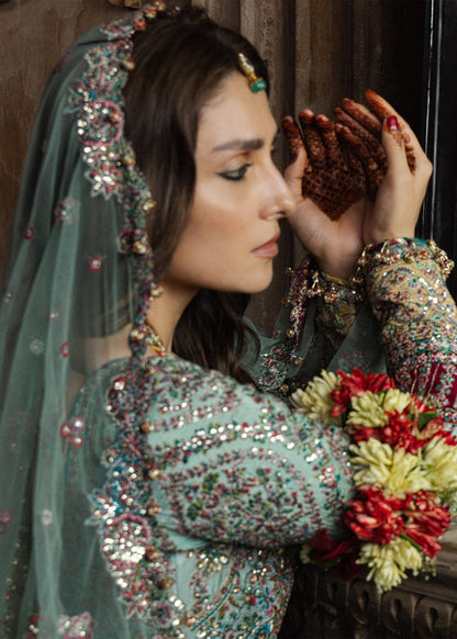 Hussain Rehar Zeenat side view of flowing pashwas