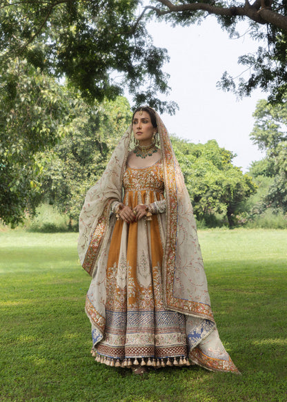 Hussain Rehar Mehru indigo, ivory and rust hem borders
