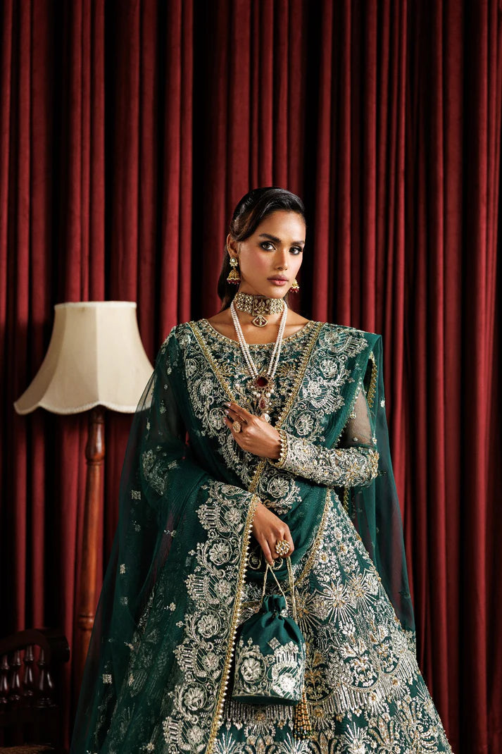 Beautiful net embroidered lehenga with hand embellished panels & sleeves. Includes net dupatta, organza belt, and 6 yards Russian grip inner fabric.