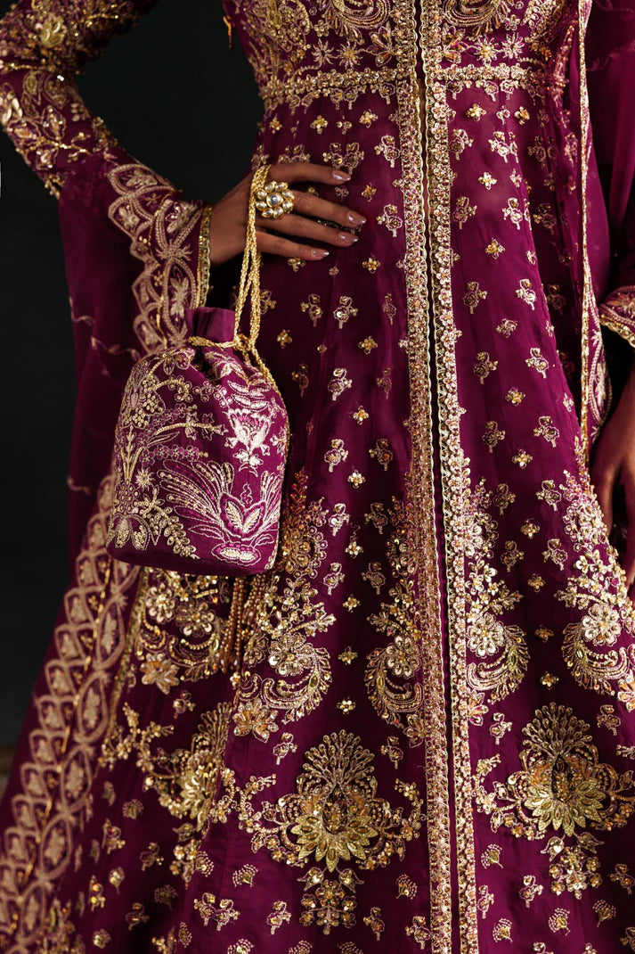 Elegant organza embroidered lehenga with hand embellished panels, sleeves & dupatta. Includes raw silk lehenga and Russian grip inner fabric.