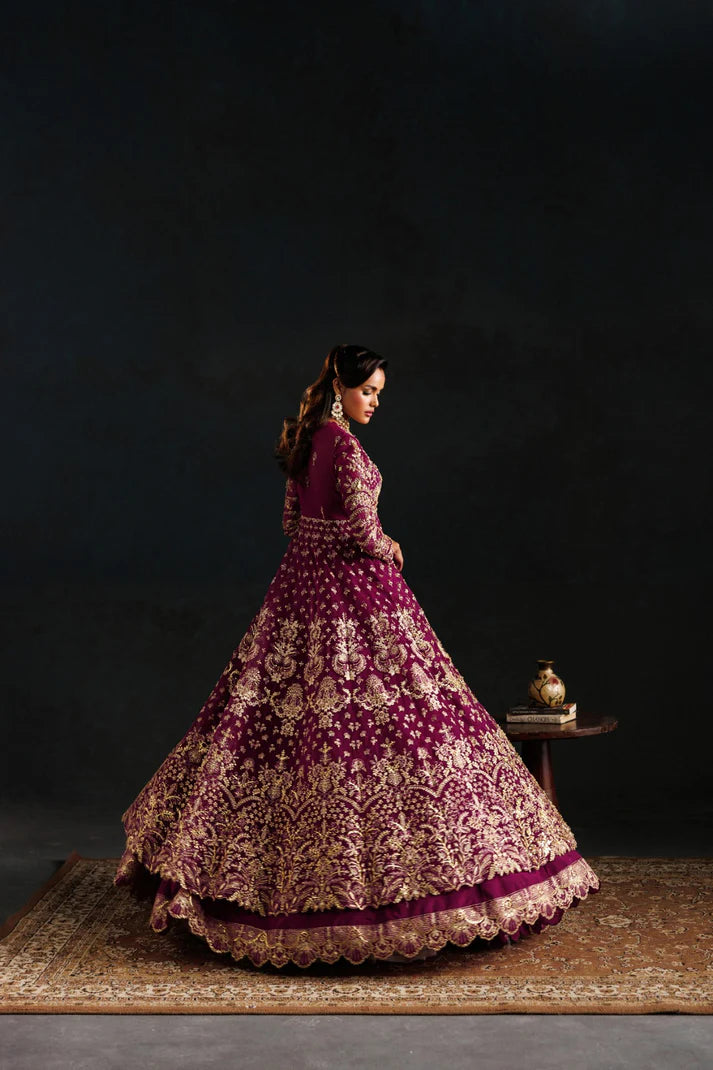 Elegant organza embroidered lehenga with hand embellished panels, sleeves & dupatta. Includes raw silk lehenga and Russian grip inner fabric.