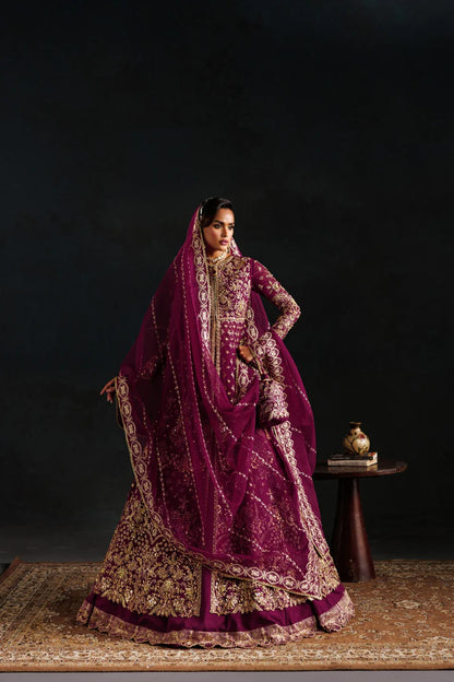 Elegant organza embroidered lehenga with hand embellished panels, sleeves & dupatta. Includes raw silk lehenga and Russian grip inner fabric.