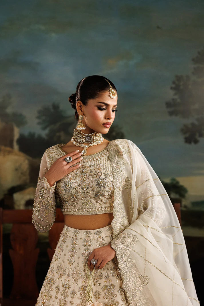 Premium organza embroidered dress with hand embellished front, sleeves & panels. Includes embroidered dupatta and 6 yards Russian grip inner fabric.