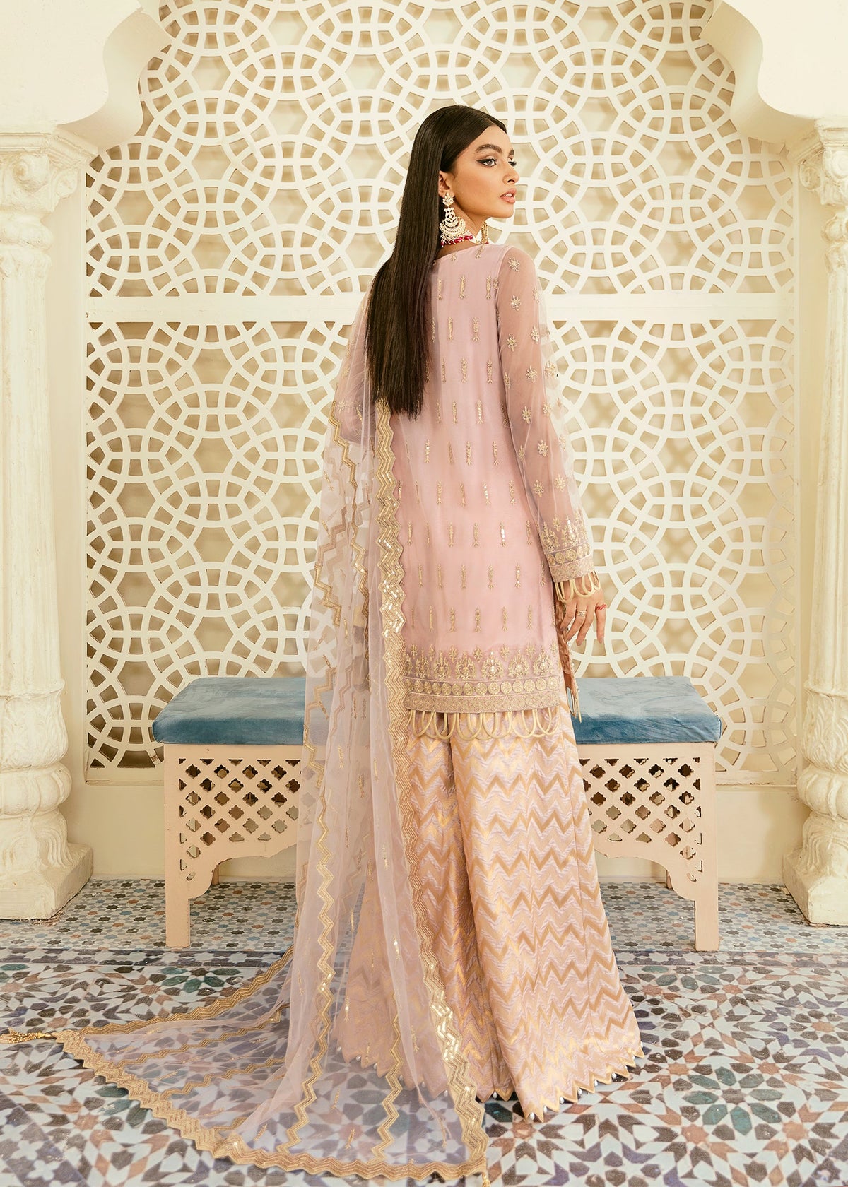 Akbar Aslam Oriole side view of embroidered net shirt