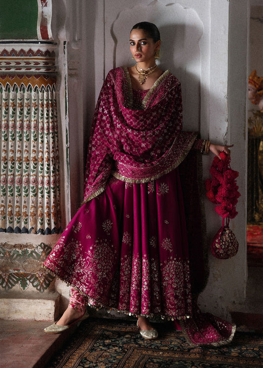 Elegant hot pink embroidered pishwas with detailed panels, Korean raw silk chooridar and a chiffon dupatta featuring all-over jaal and four sided borders.