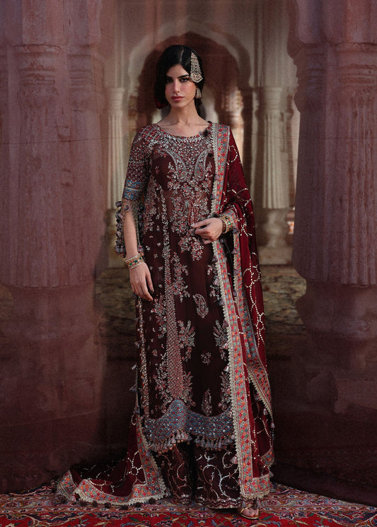 Elegant dark brown chiffon suit featuring embroidery, chatapatti trims, Korean raw silk trousers and a foil printed chiffon dupatta for a timeless look.