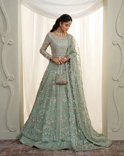 Selin lehenga set in mint green organza with heritage embroidery, paired with raw silk skirt and embroidered dupatta—perfect for weddings and festive celebrations.