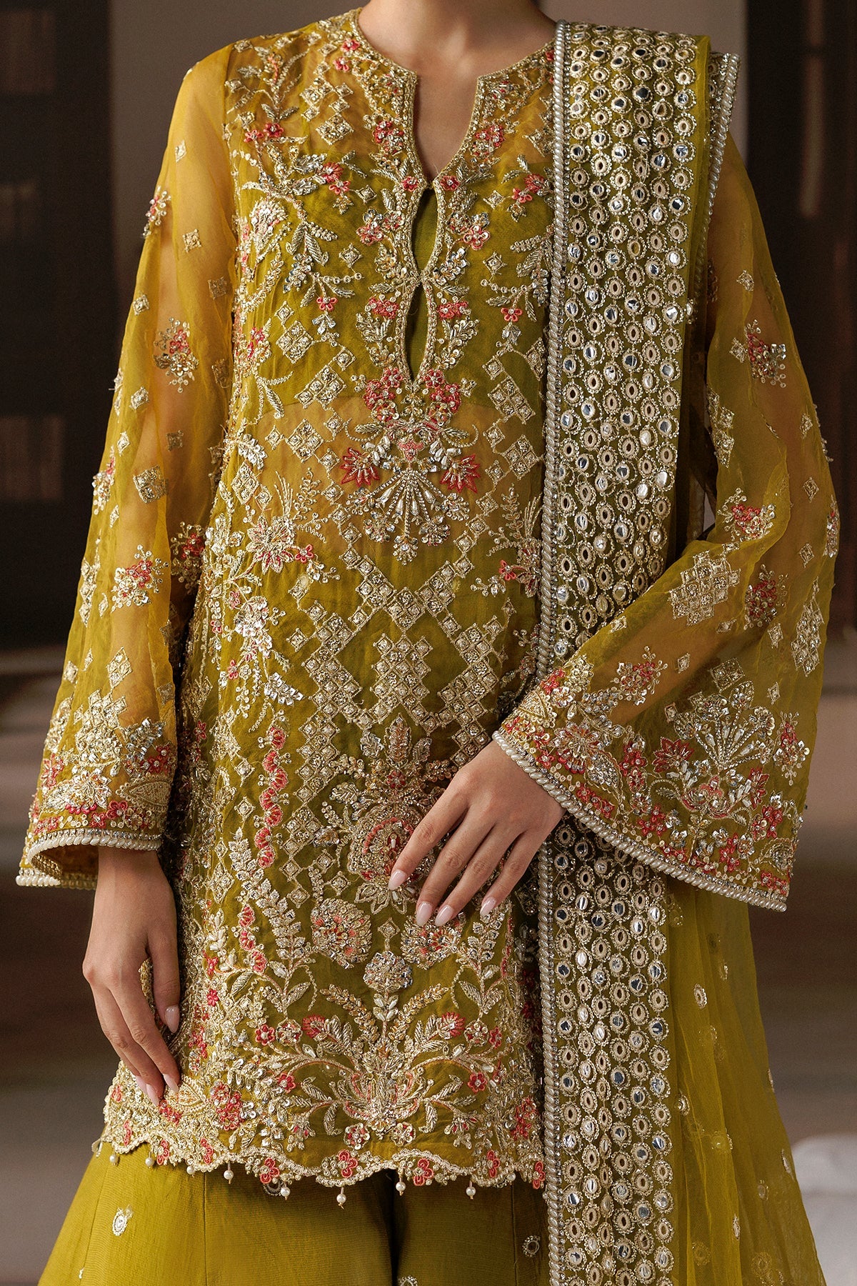 Zarminay by Afrozeh – Pakistani wedding guest outfit in mustard gold