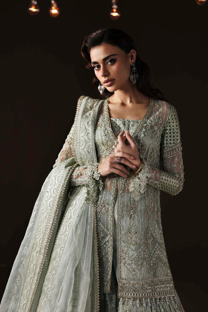Shop organza embroidered sharara dress with hand embellishments & dupatta. Includes detailed borders & inner—perfect for weddings & festive wear.