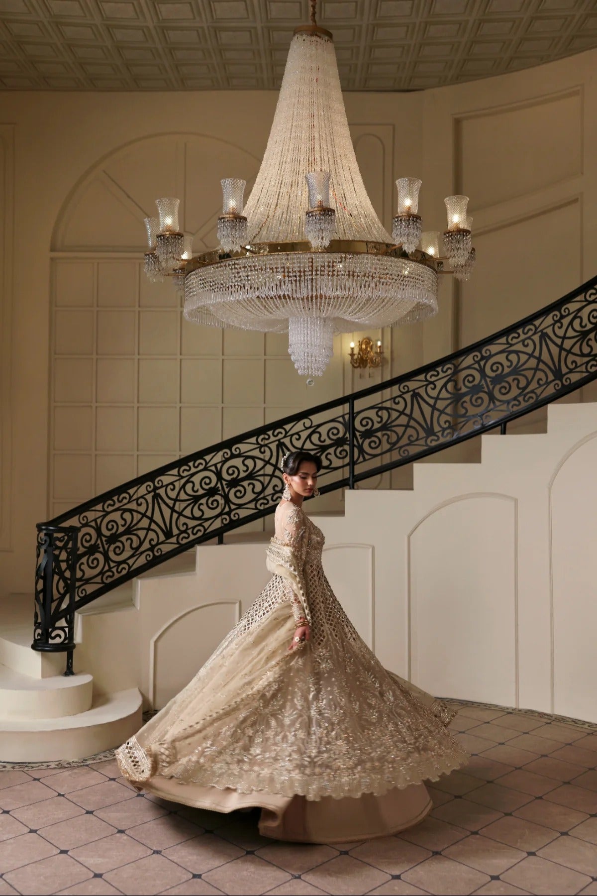 Luxurious hand-embellished organza dress with detailed panels, embroidered dupatta, Russian grip inner, and raw silk lehenga fabric for a regal ensemble.