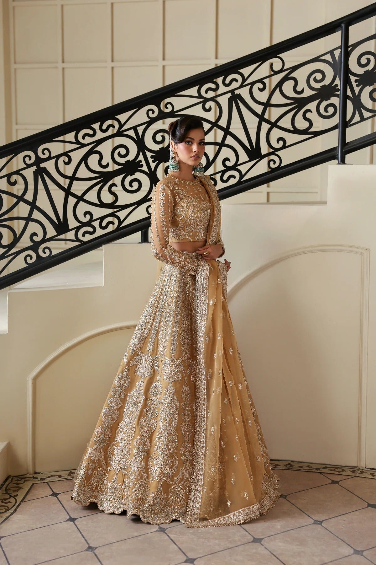 Graceful organza dress featuring hand-embellished body, sleeves, embroidered panels, and dupatta. Paired with 6 yards dyed Russian grip inner for full coverage.