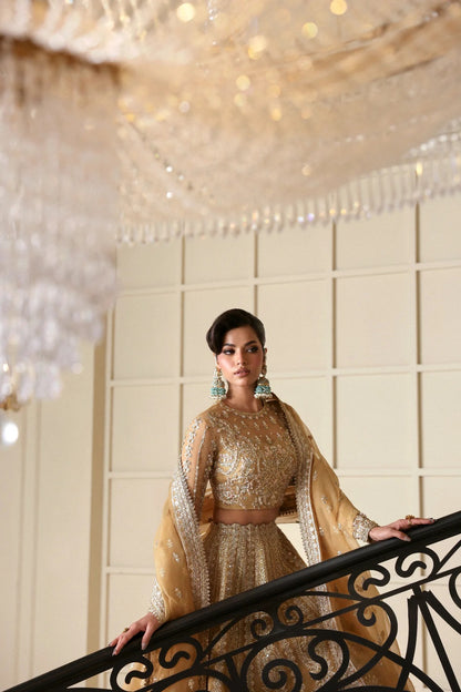 Graceful organza dress featuring hand-embellished body, sleeves, embroidered panels, and dupatta. Paired with 6 yards dyed Russian grip inner for full coverage.