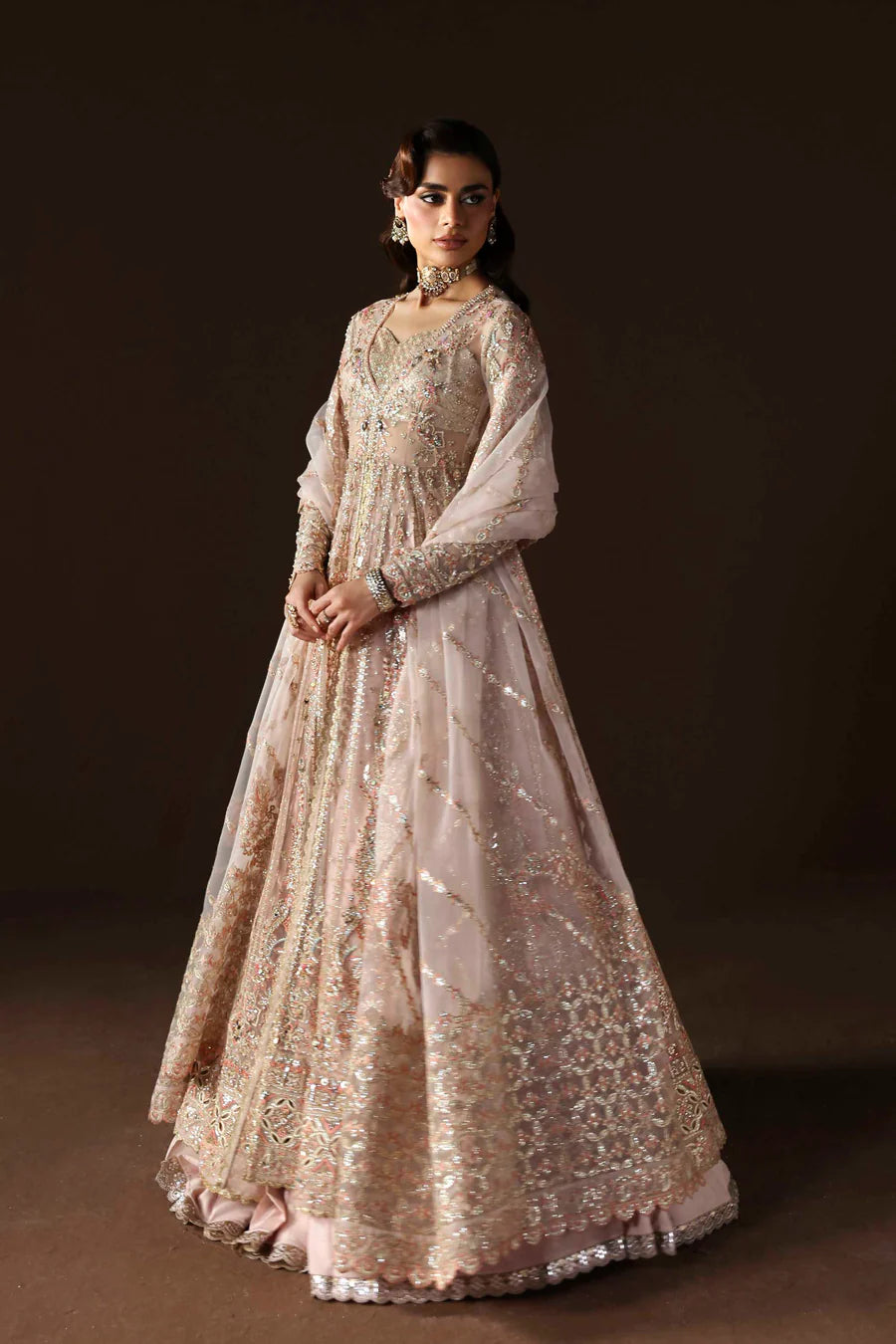 Shop organza embroidered lehenga with hand embellished blouse, panels & dupatta. Includes raw silk lehenga & lining—perfect for weddings & events.