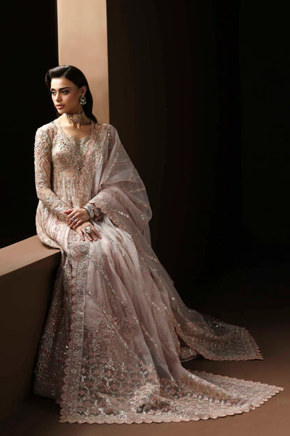Shop organza embroidered lehenga with hand embellished blouse, panels & dupatta. Includes raw silk lehenga & lining—perfect for weddings & events.