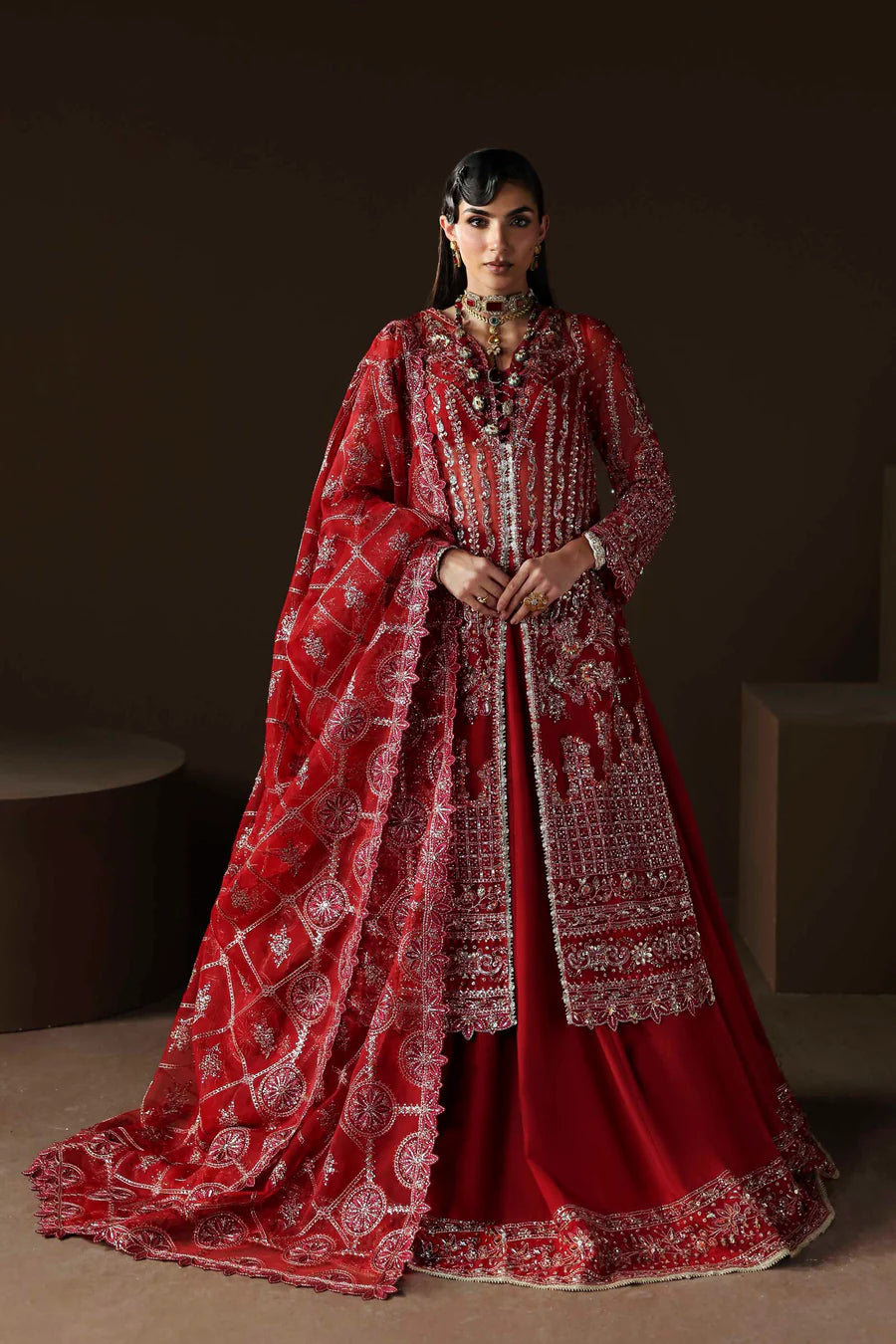 Shop organza embroidered lehenga dress with hand embellishments & dupatta. Includes raw silk lehenga & inner—perfect for weddings & festive wear.