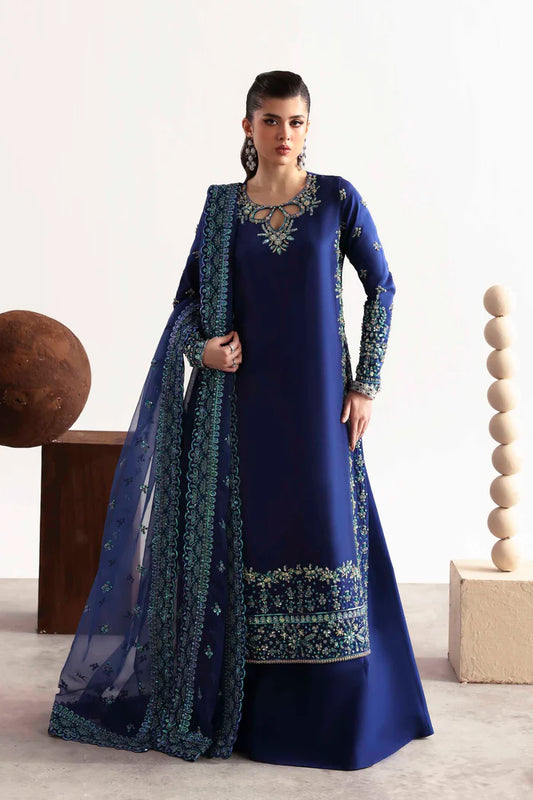 Luxury silk suit featuring hand-embroidered front, back, and sleeves, dyed silk trouser, and a 3-yard organza dupatta for a complete festive ensemble.