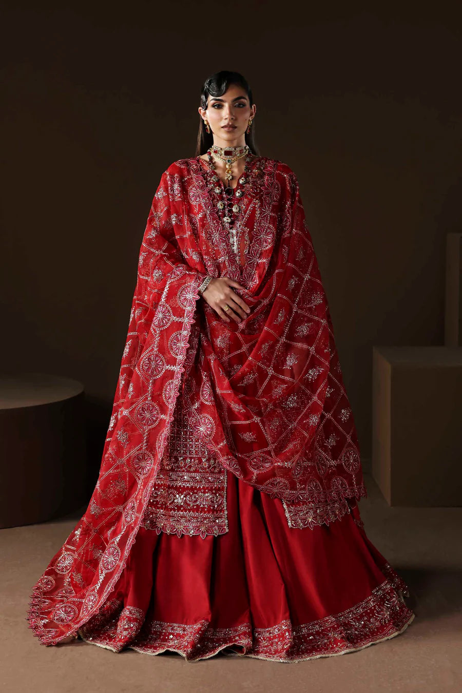 Shop organza embroidered lehenga dress with hand embellishments & dupatta. Includes raw silk lehenga & inner—perfect for weddings & festive wear.
