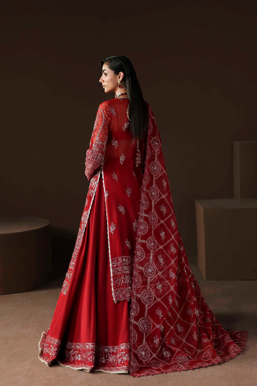Shop organza embroidered lehenga dress with hand embellishments & dupatta. Includes raw silk lehenga & inner—perfect for weddings & festive wear.