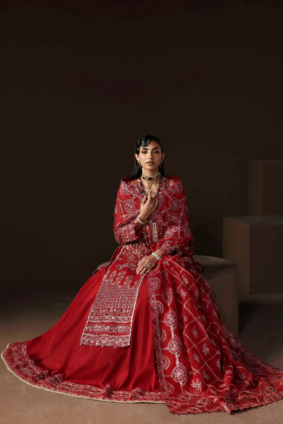 Shop organza embroidered lehenga dress with hand embellishments & dupatta. Includes raw silk lehenga & inner—perfect for weddings & festive wear.