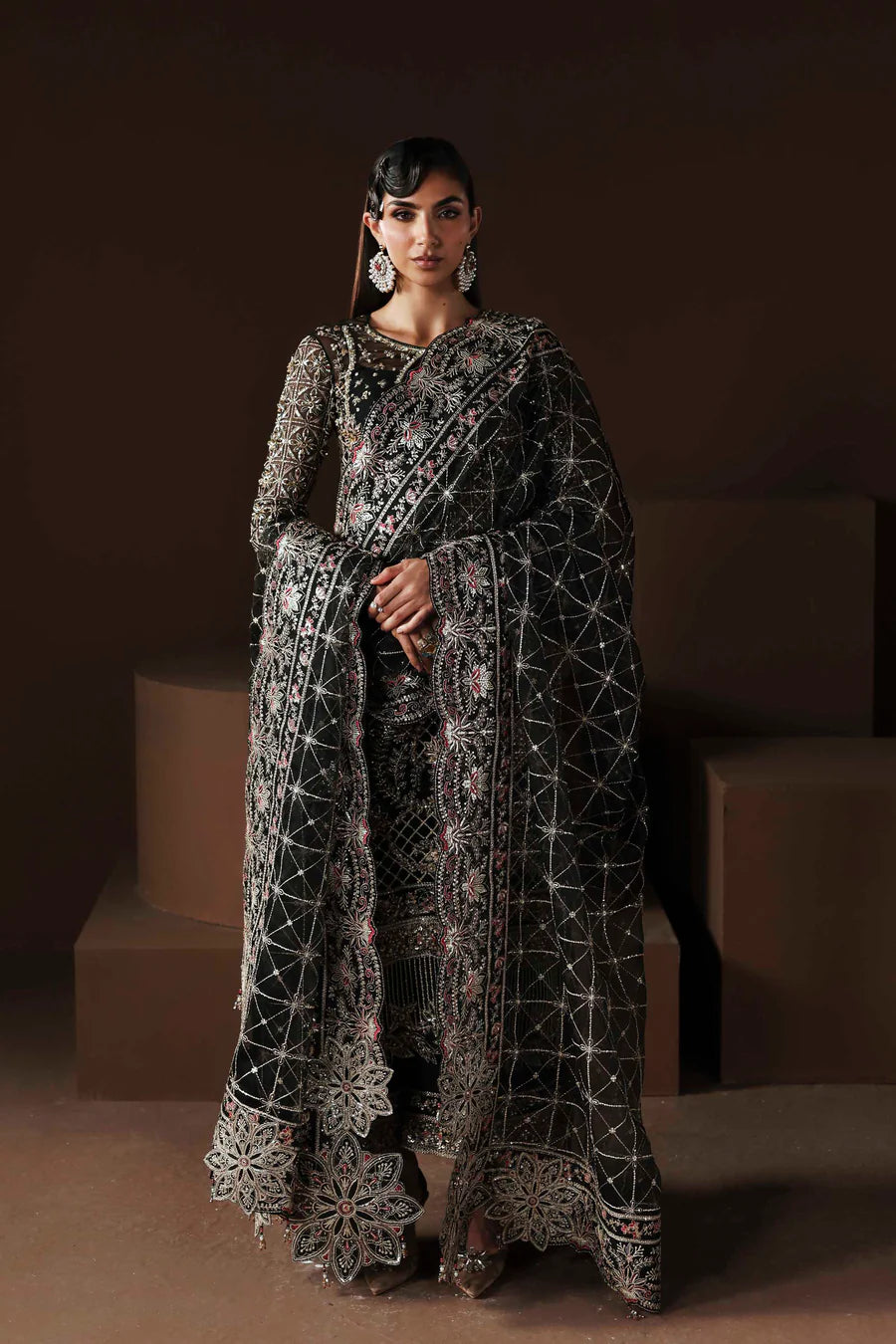 Shop organza embroidered saree with hand embellished blouse, pallu & borders. Includes raw silk inner—perfect for weddings & festive occasions.