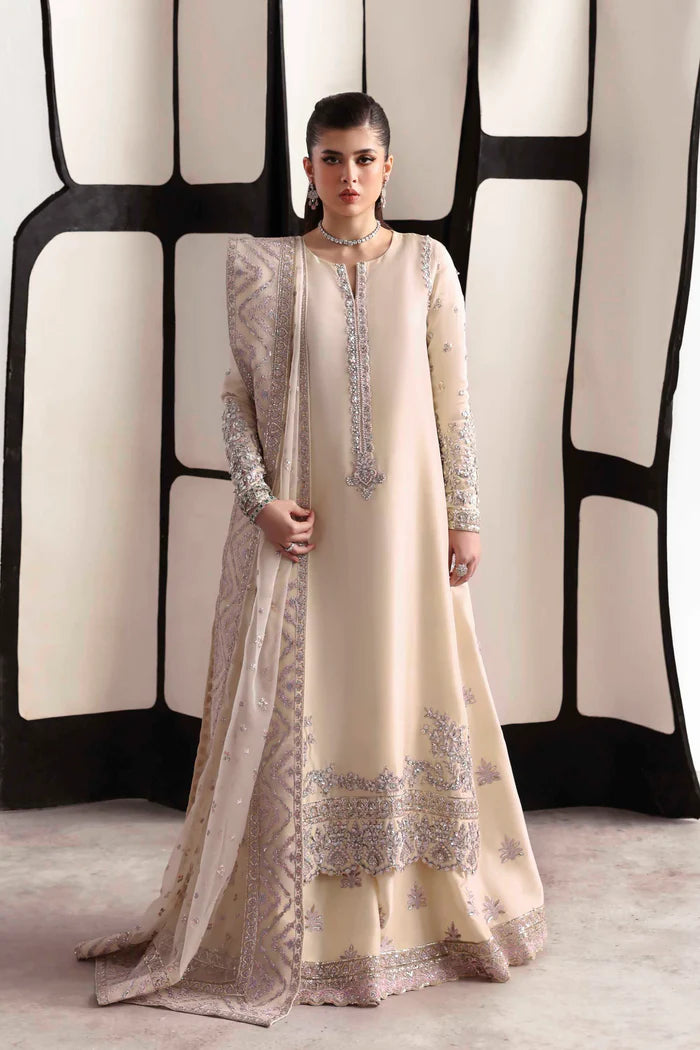 Elegant silk suit featuring hand-embroidered front, back, and sleeves, matching embroidered trouser, and a 3-yard organza dupatta for a complete festive look.