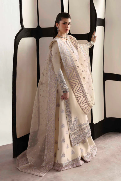 Elegant silk suit featuring hand-embroidered front, back, and sleeves, matching embroidered trouser, and a 3-yard organza dupatta for a complete festive look.