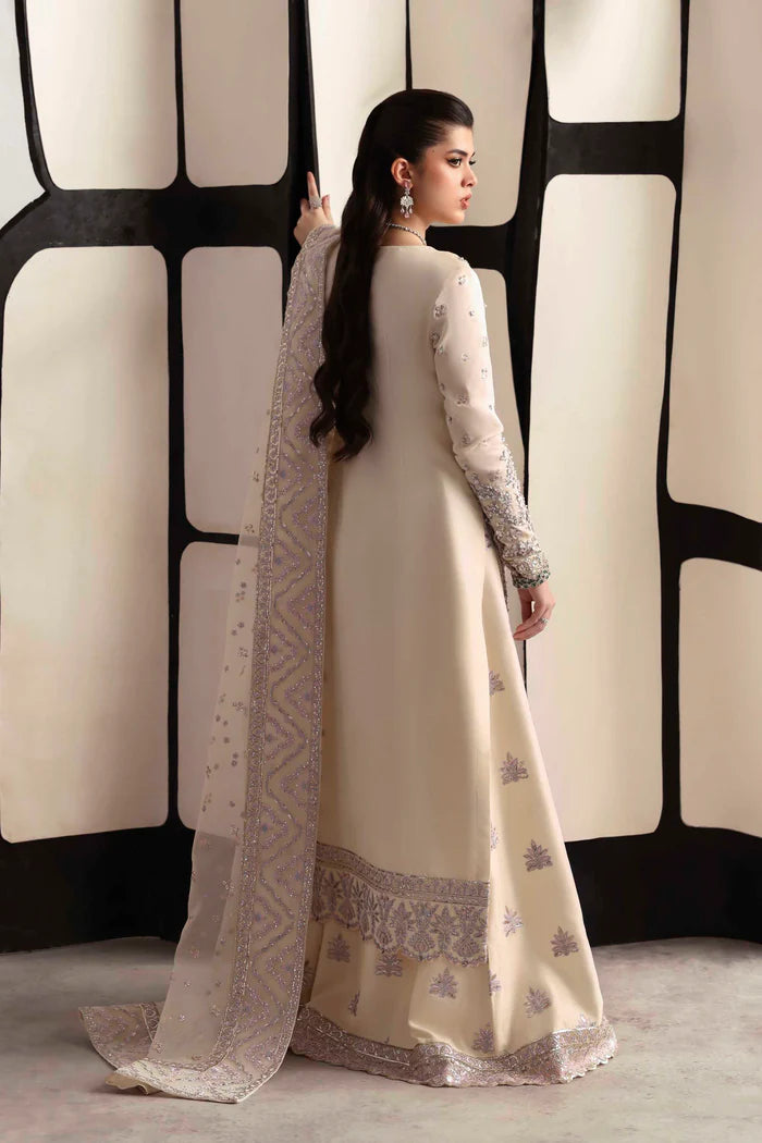 Elegant silk suit featuring hand-embroidered front, back, and sleeves, matching embroidered trouser, and a 3-yard organza dupatta for a complete festive look.