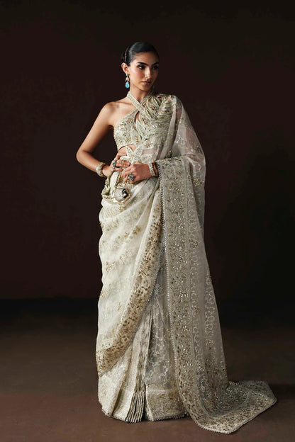 Shop luxury organza embroidered saree with hand embellished blouse, pallu & borders. Includes raw silk inner—perfect for weddings & festive wear.