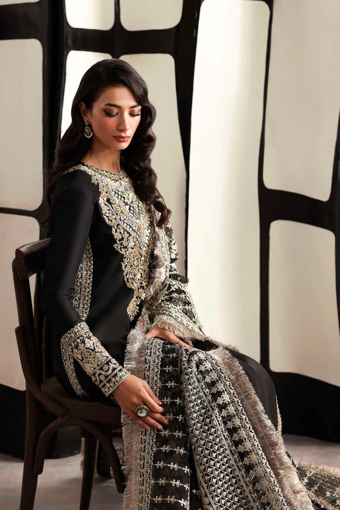 Luxury organza suit with hand-embroidered front and back necklines, detailed borders, embroidered dupatta, and dyed silk for front, back, sleeves, and trouser.