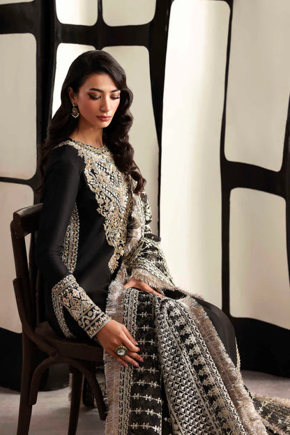 Luxury organza suit with hand-embroidered front and back necklines, detailed borders, embroidered dupatta, and dyed silk for front, back, sleeves, and trouser.