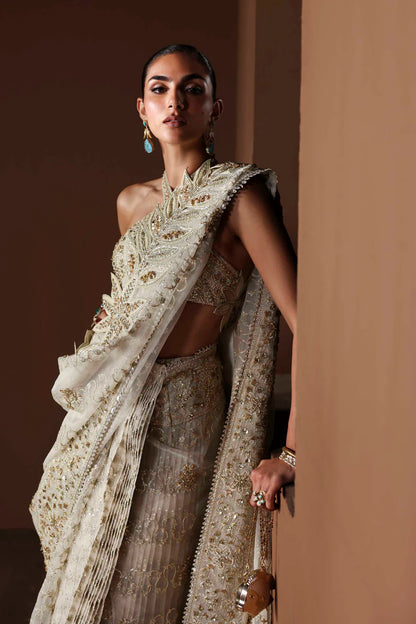 Shop luxury organza embroidered saree with hand embellished blouse, pallu & borders. Includes raw silk inner—perfect for weddings & festive wear.