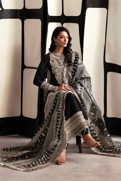 Luxury organza suit with hand-embroidered front and back necklines, detailed borders, embroidered dupatta, and dyed silk for front, back, sleeves, and trouser.