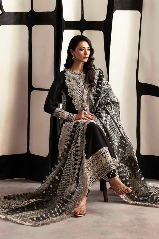 Luxury organza suit with hand-embroidered front and back necklines, detailed borders, embroidered dupatta, and dyed silk for front, back, sleeves, and trouser.