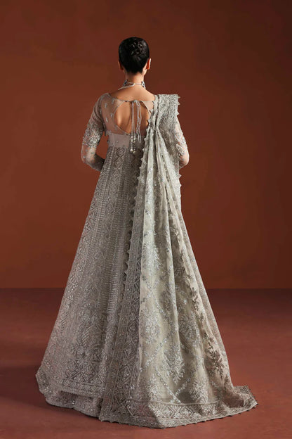 Shop luxury organza embroidered lehenga with hand embellished blouse, panels & dupatta. Includes raw silk lehenga & lining—perfect for weddings.