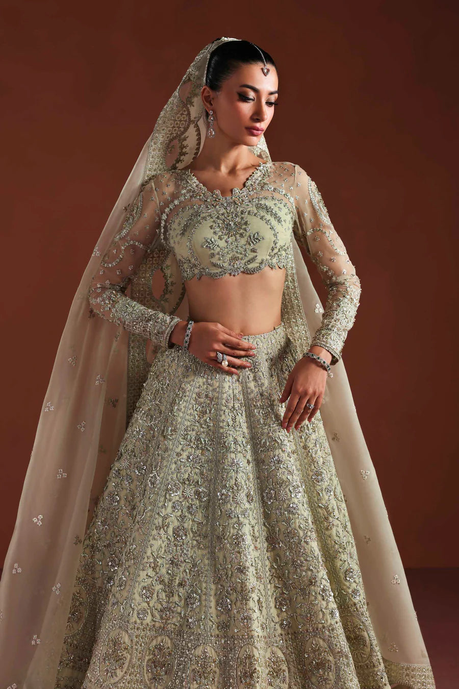 Shop organza embroidered dress with hand embellished panels, belt & dupatta. Includes inner—perfect for weddings, parties & festive wear.