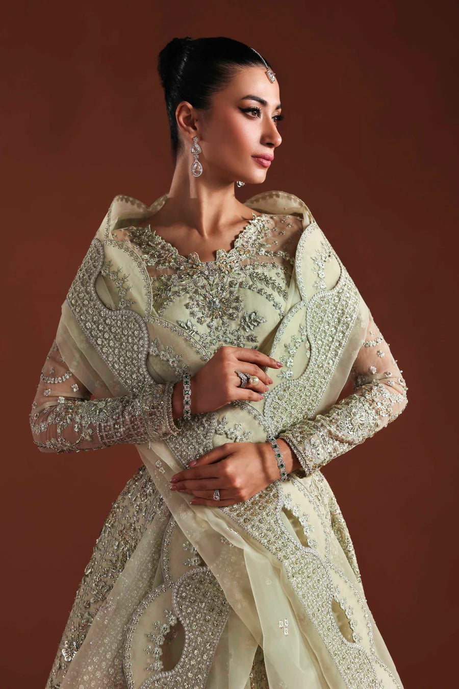 Shop organza embroidered dress with hand embellished panels, belt & dupatta. Includes inner—perfect for weddings, parties & festive wear.