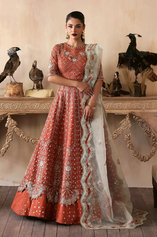 Elegant hand-embroidered organza suit with detailed front, back, and sleeves panels, complemented by an embroidered organza dupatta—perfect for festive and formal occasions.