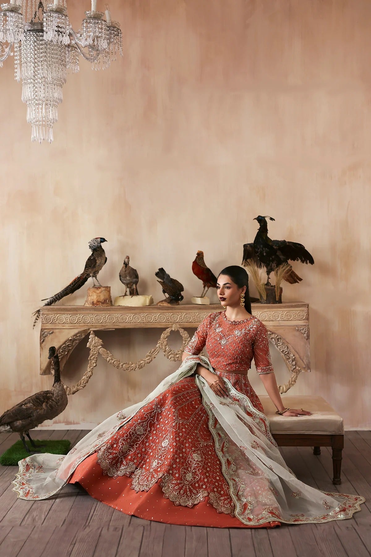 Elegant hand-embroidered organza suit with detailed front, back, and sleeves panels, complemented by an embroidered organza dupatta—perfect for festive and formal occasions.